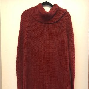 Long, oversized burnt orange turtleneck